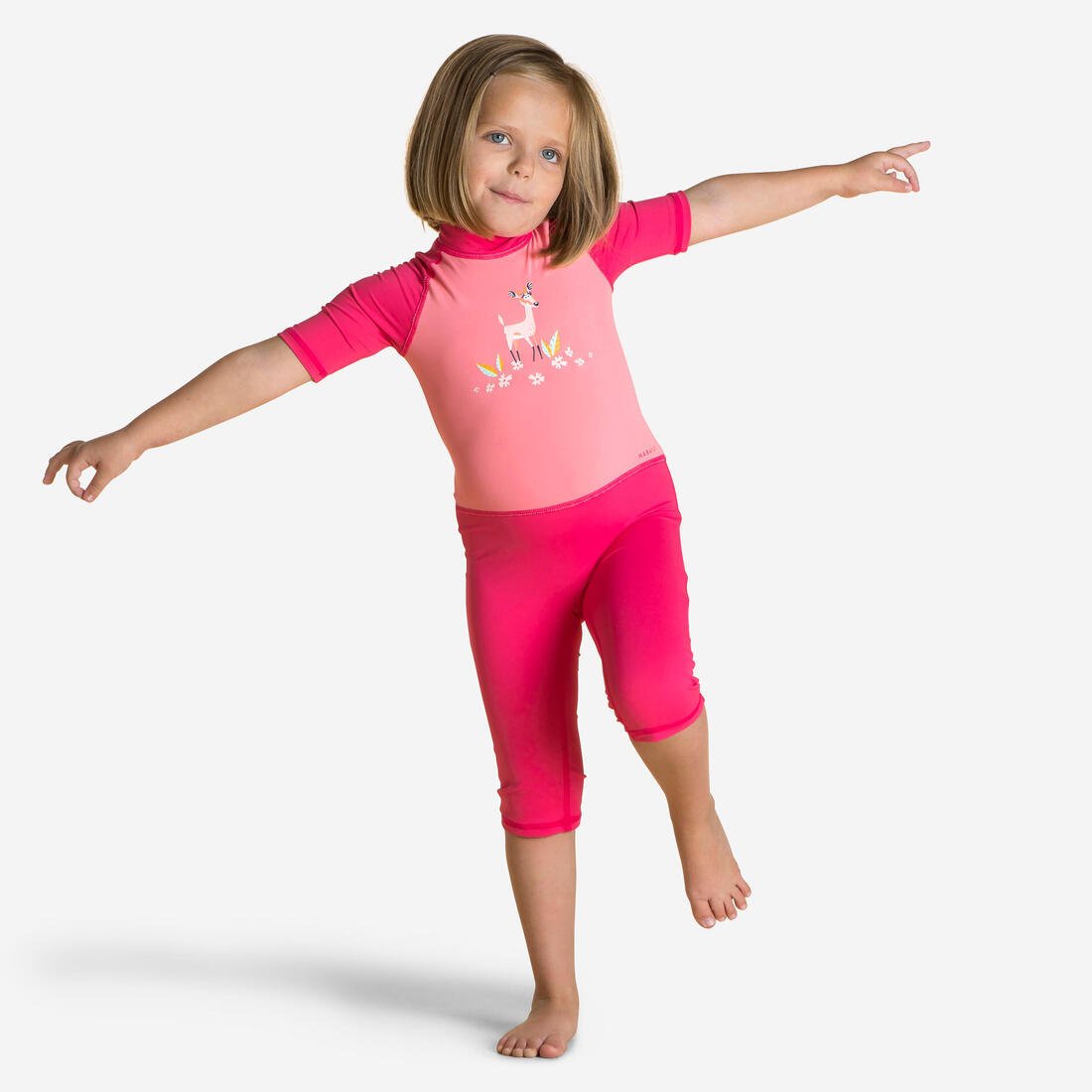 article en promo : Combinaison de natation anti uv bébé / enfant manches courtes rose imprimé